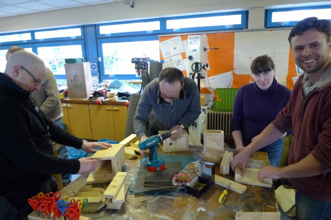Happy course participants in 2013, building their green roof bird boxes