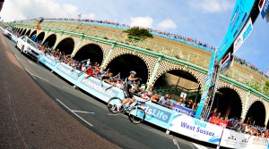 Cyclist about to cross finish line Brighton tour of britain 2014