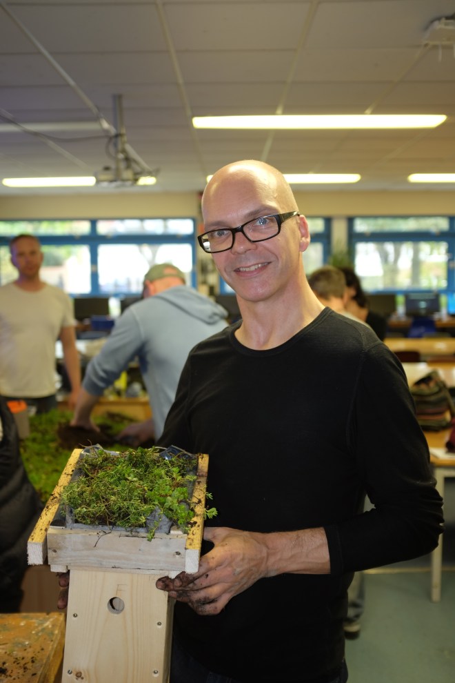 Happy green roofer with the green roofed bird box we built on the Building Green DIY weekend