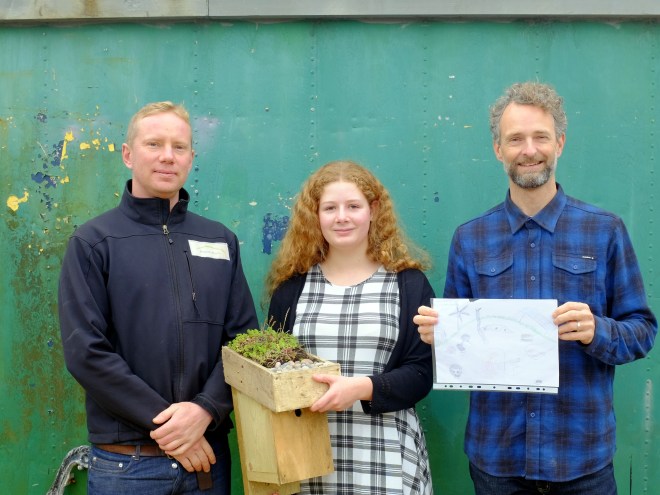 Organic Roofs and Building Green presenting the Big Nature drawing competition prize to Tamsin